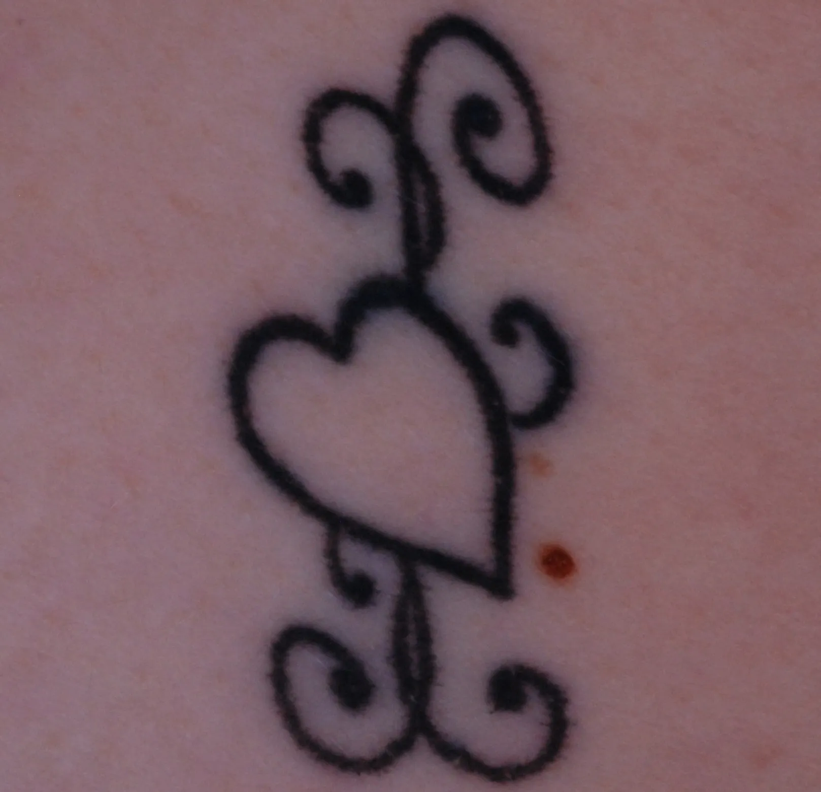 Decorative Heart — tattoo before laser removal treatment