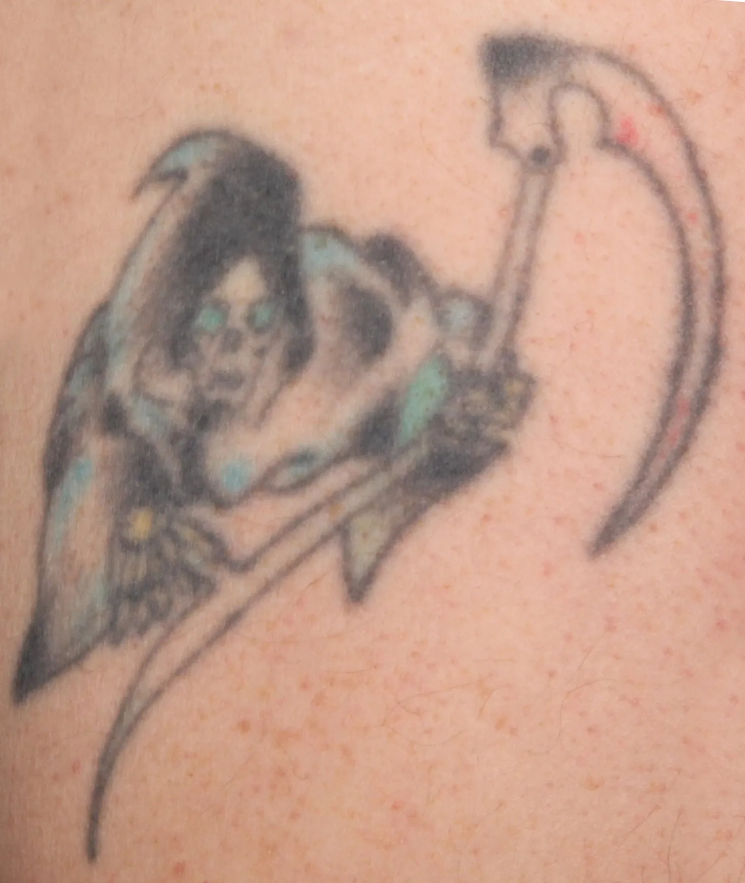 Coloured Reaper — tattoo before laser removal treatment